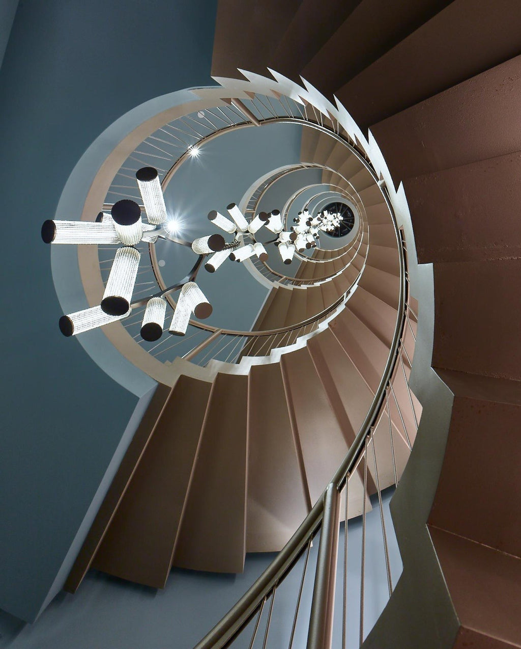 Rhea Modern Simple Staircase Chandelier vertical view inside a spiral staircase