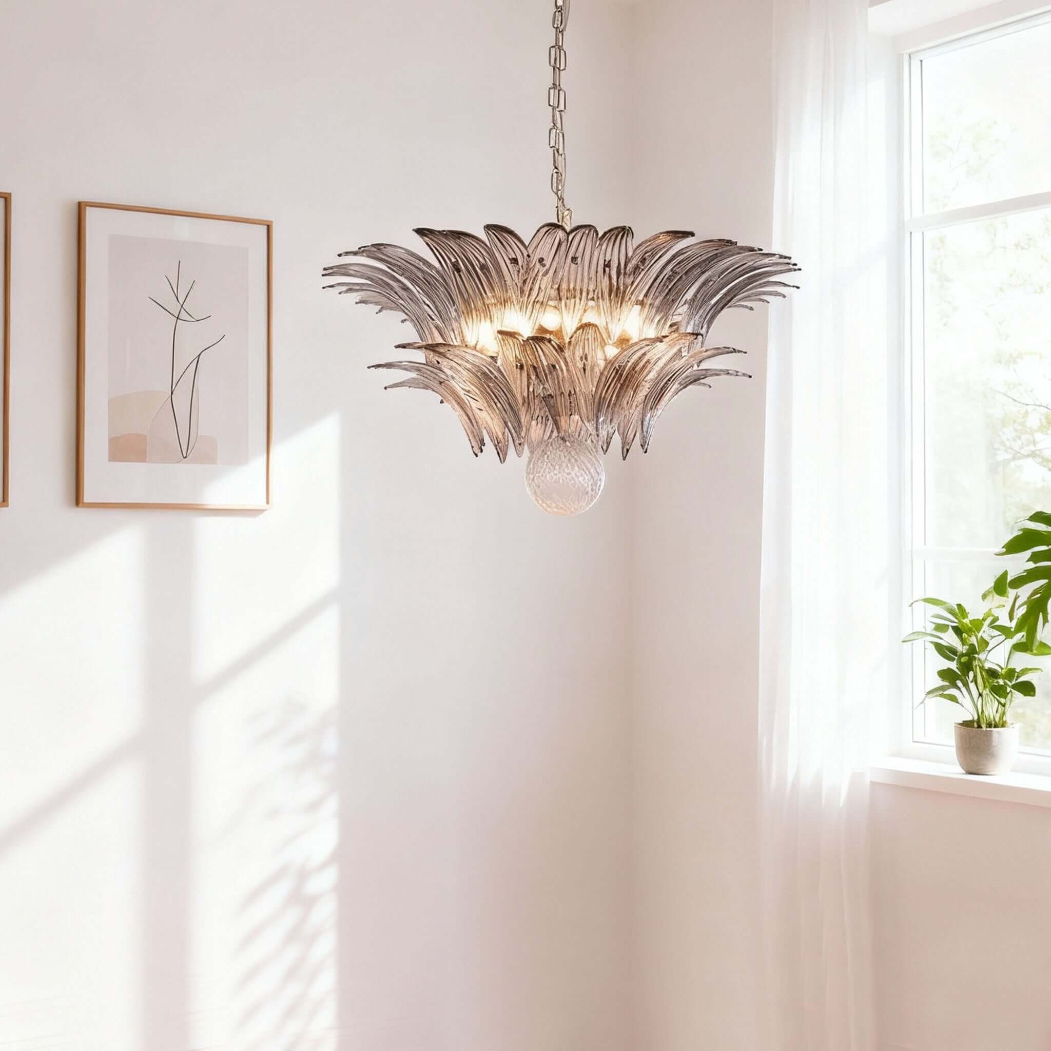 Pink glass chandelier hanging near a bright corner wall and window.