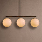 Wescott Linear Globe Chandelier - BrassMilkManorlights